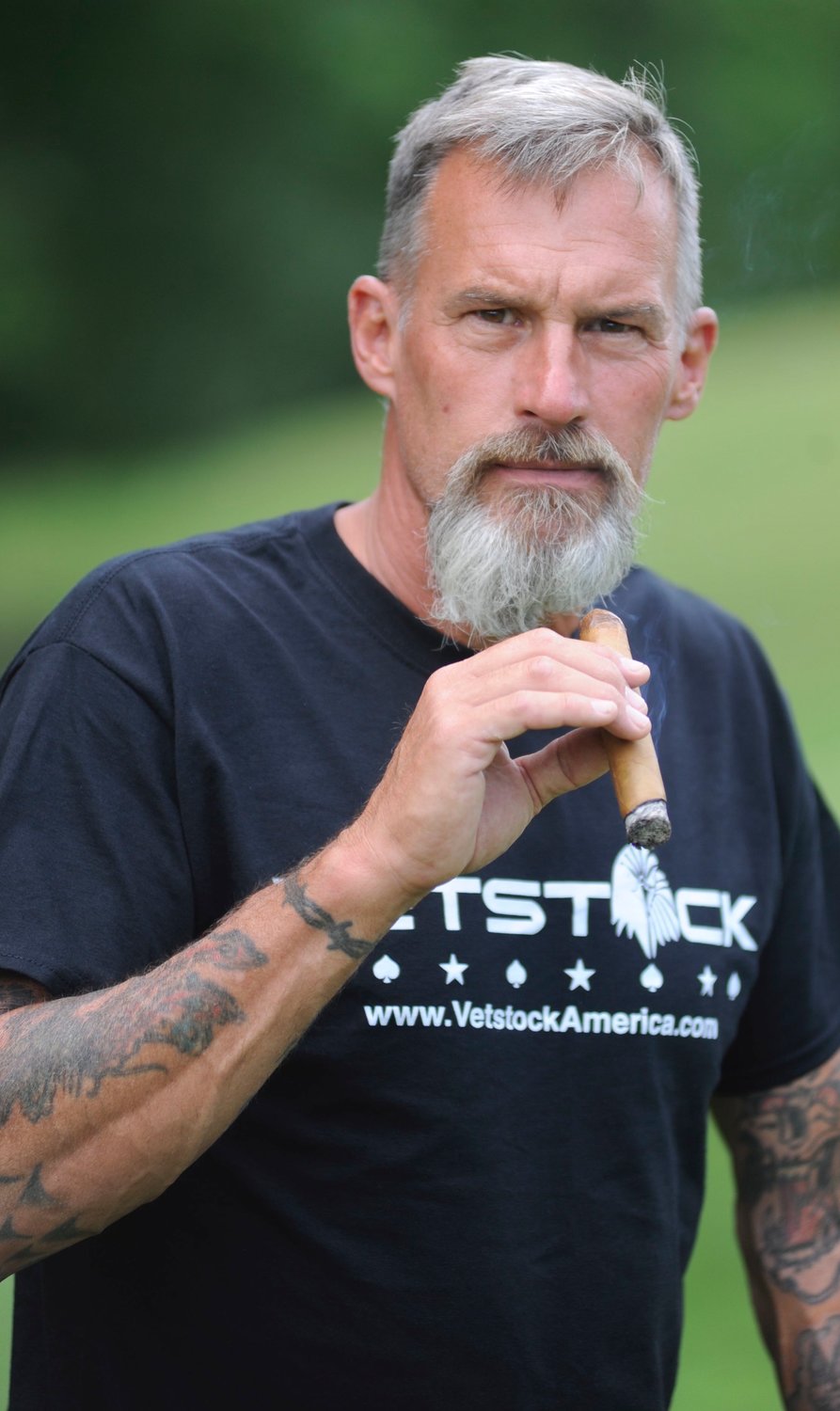 Portrait of a warrior. Jim “Strapper” Strasser served his country for 29 years and saw combat during four tours in Iraq, Bosnia and Kuwait. He led the crowd in reciting the Spartan Pledge to fight suicide among the nation’s military.